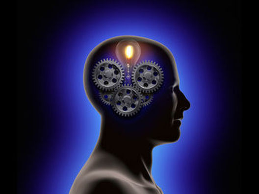 Picture of a Head with Gears and a Light Bulb